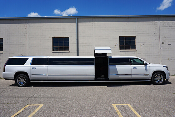 Our white Cadillac Escalade limousine rental