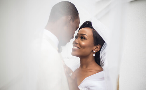 smiling bride and groom